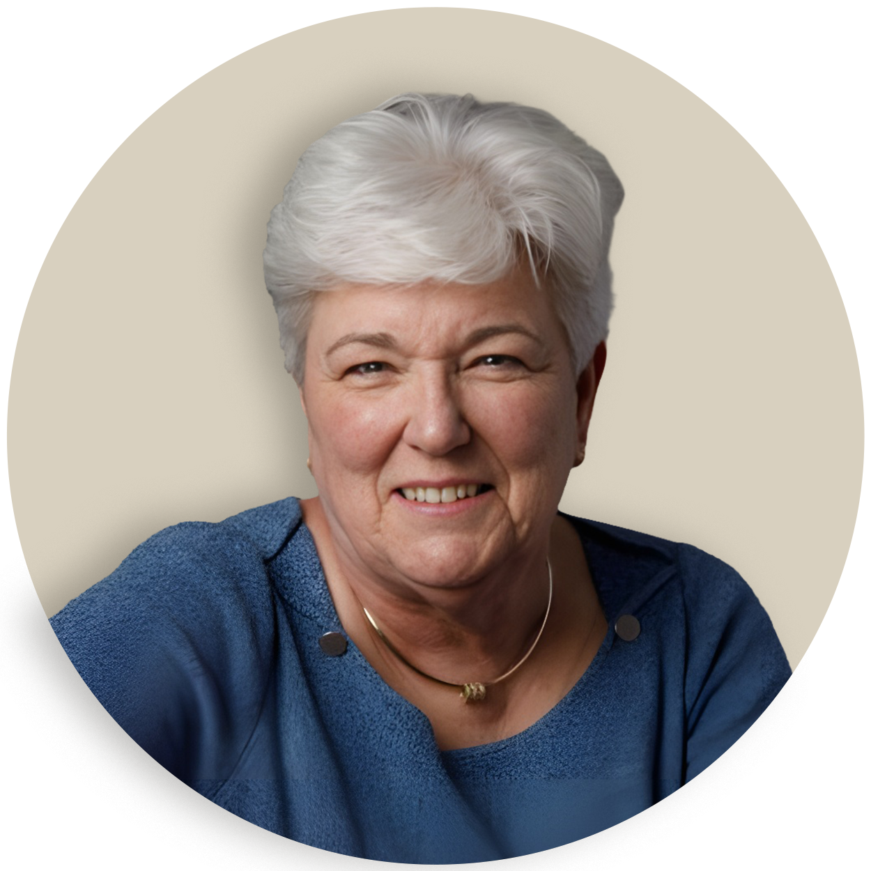 Portrait of Karen Diefendorf with short white hair wearing a blue top