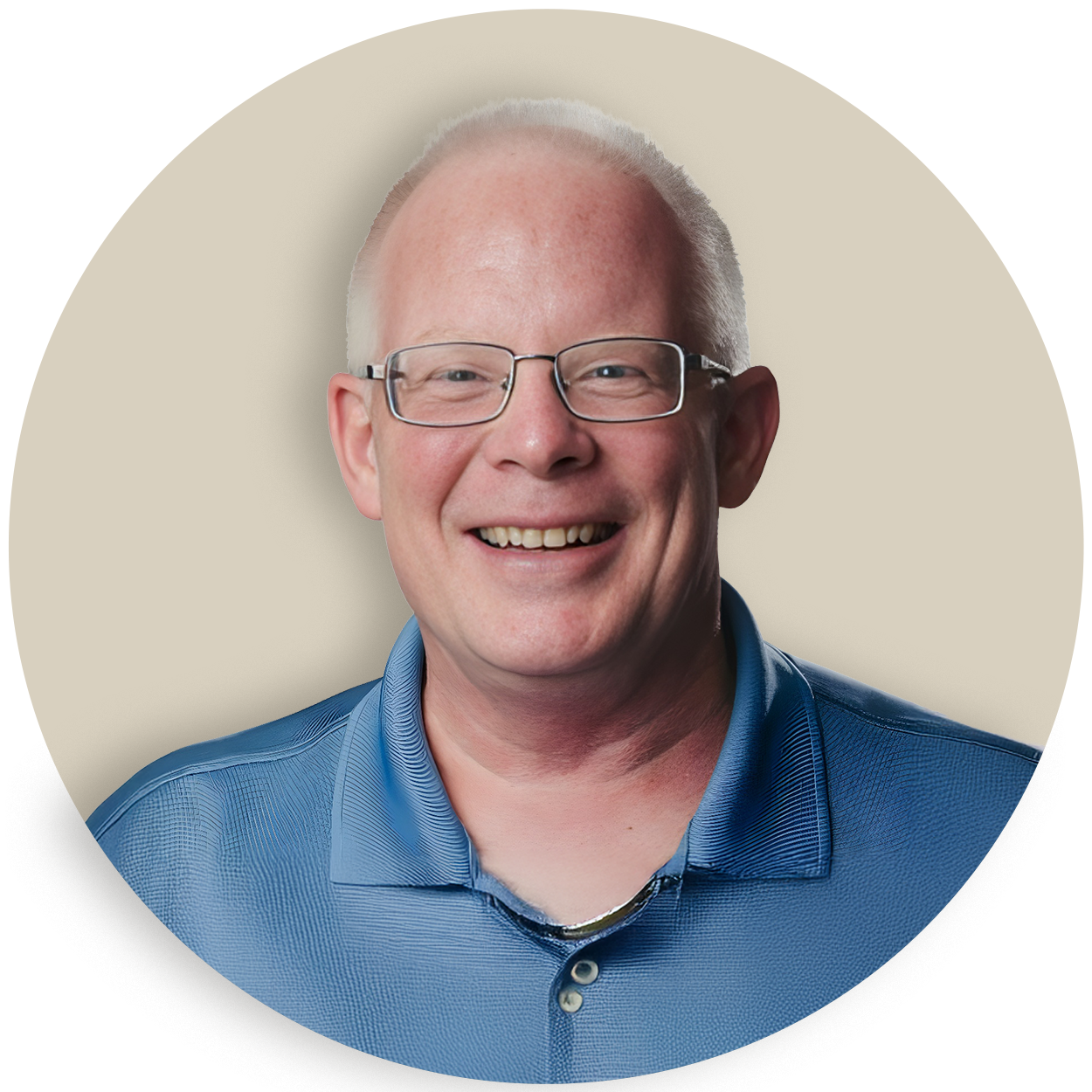 Portrait of Mark Scott wearing glasses and a blue polo shirt